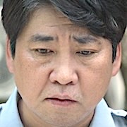 Unmasked-Son Kang-Kuk.jpg